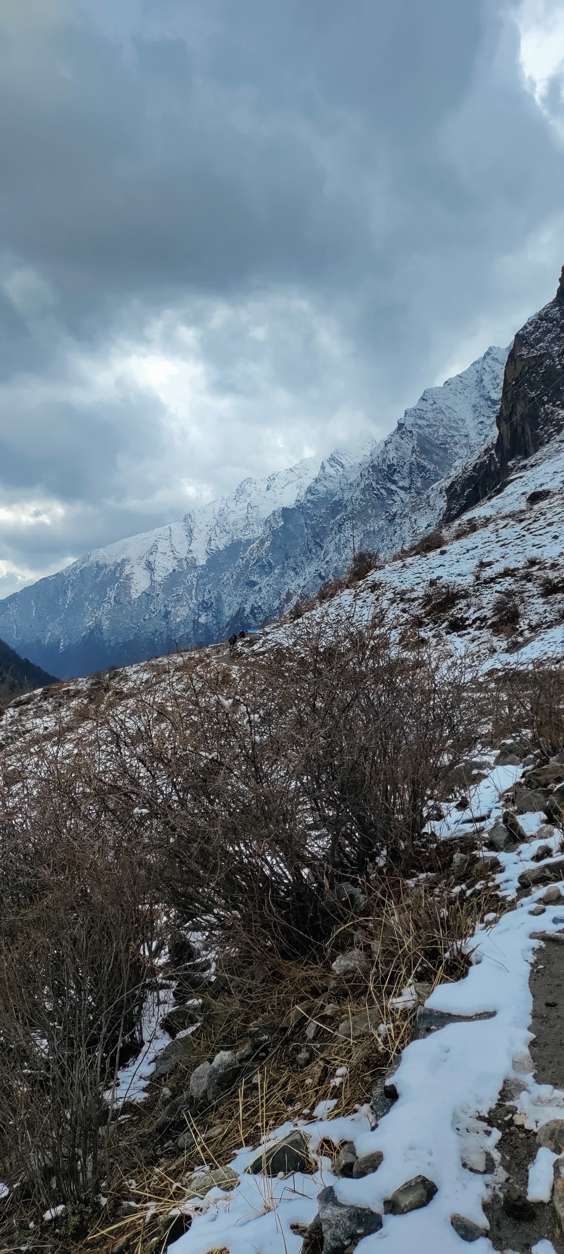 Snow-covered trail descending from Gosaikunda