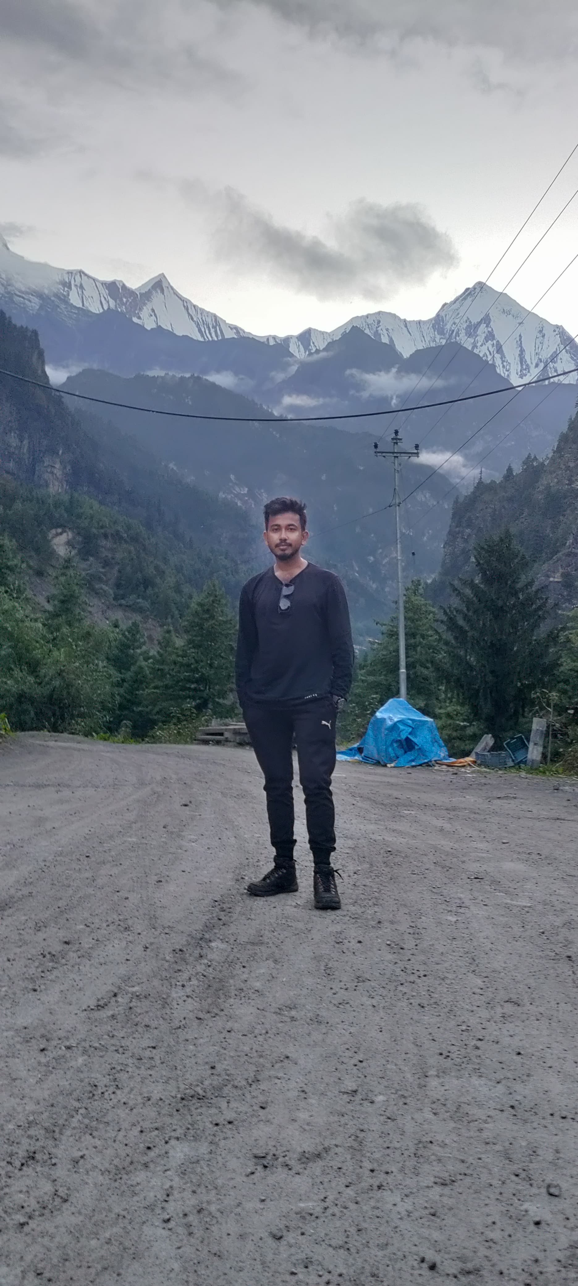 Man walking on mountain path