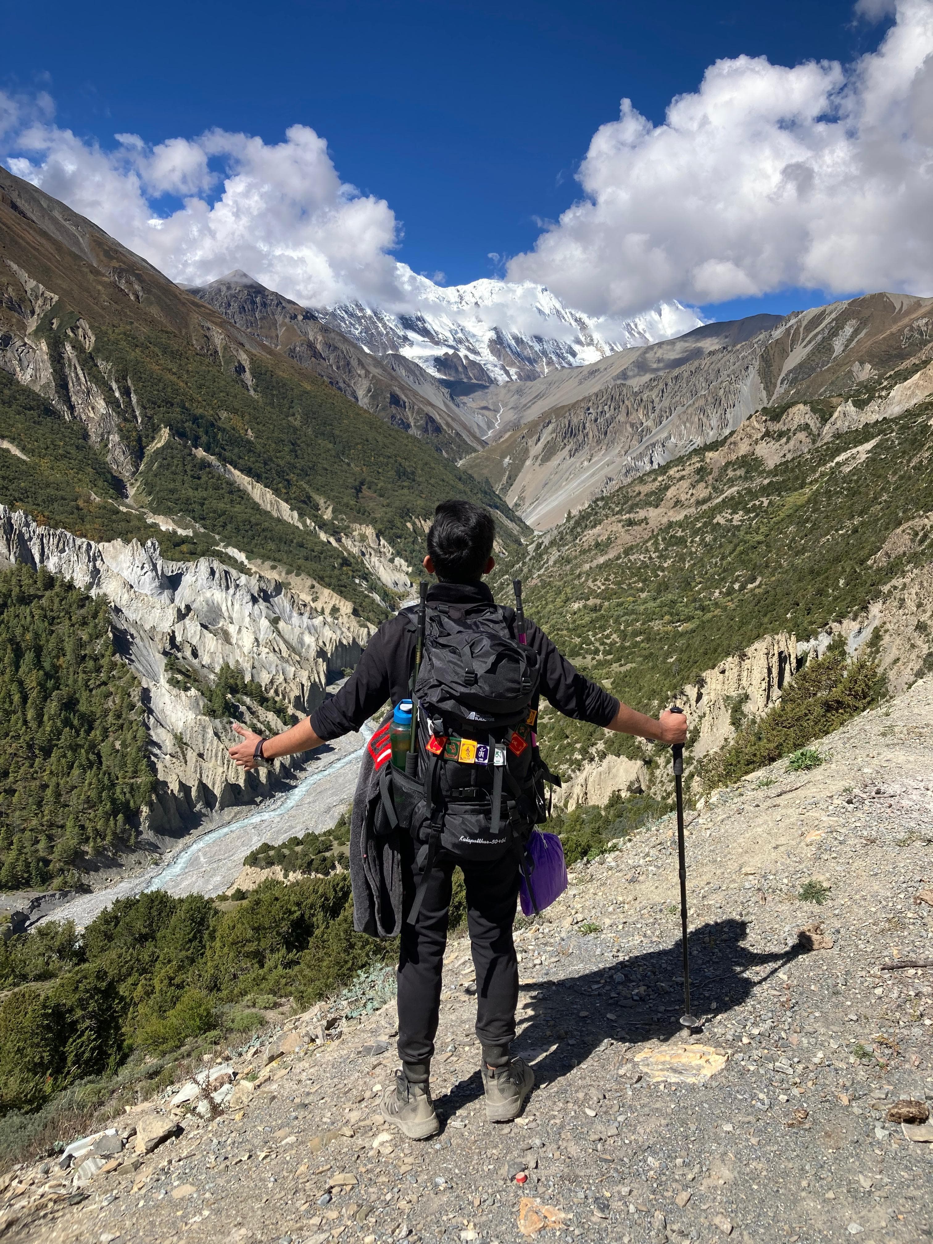 Men trekking on rocky trail
