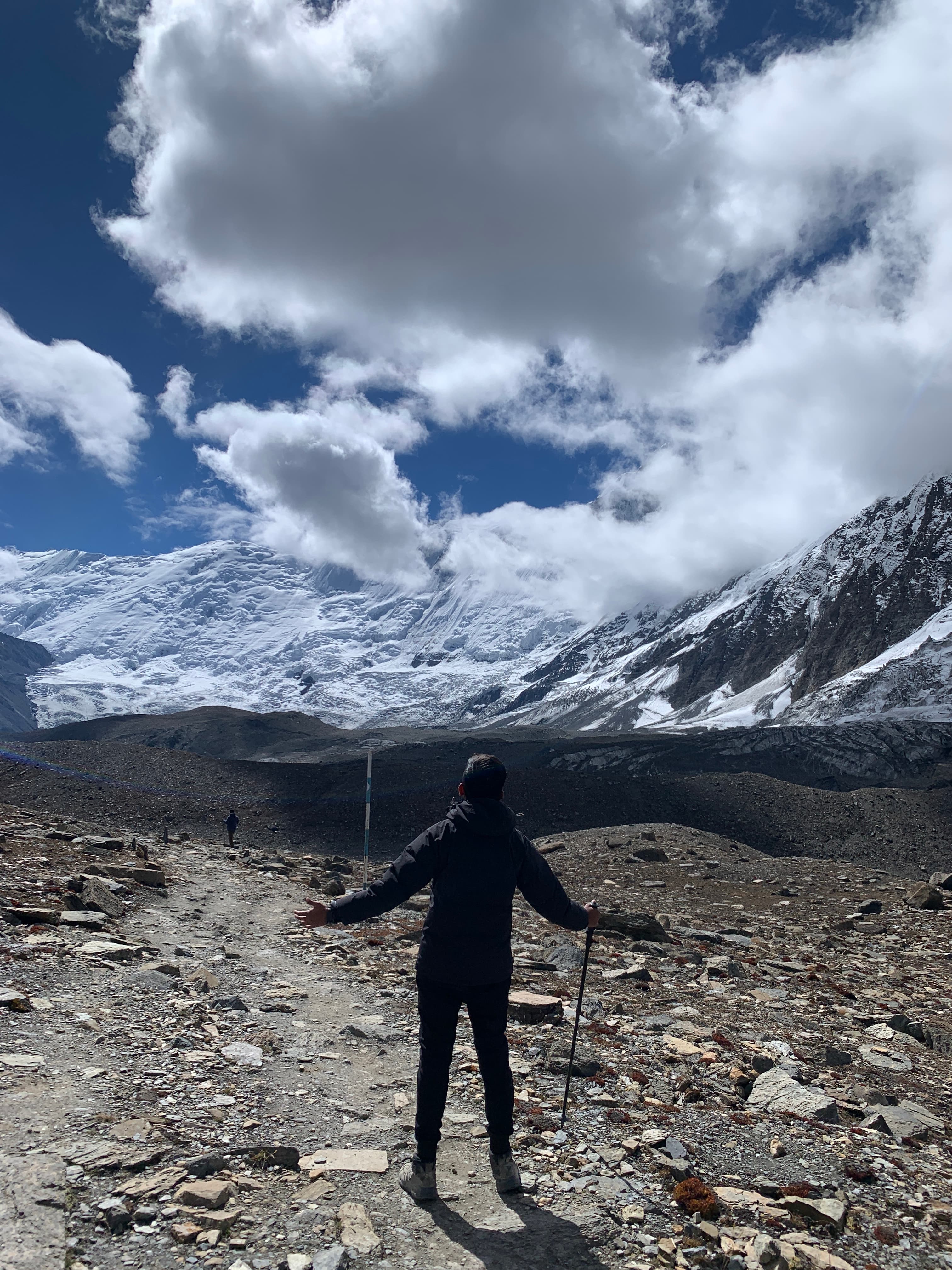 Standing under big sky and clouds