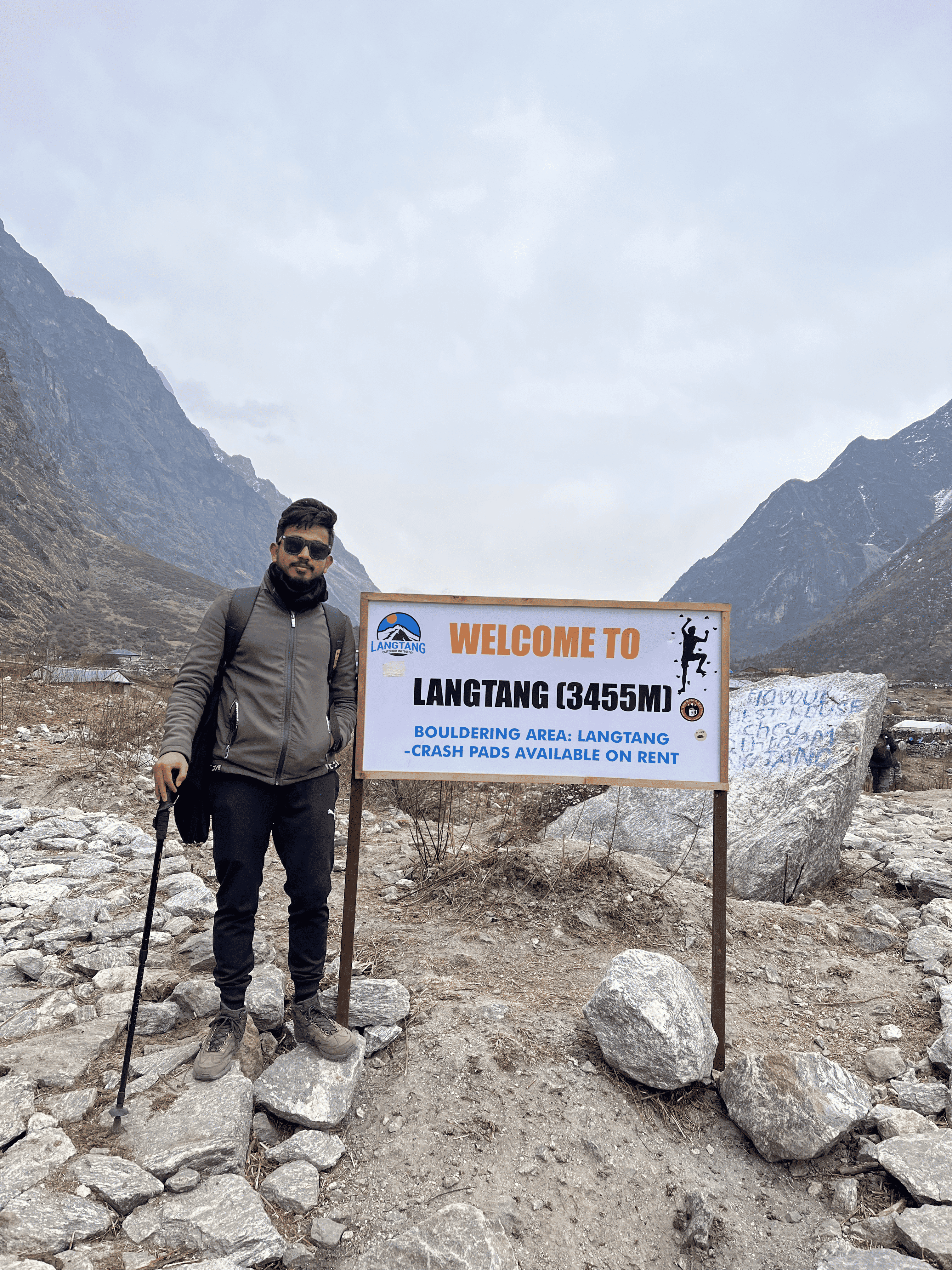 Langtang trail marker and mountain path