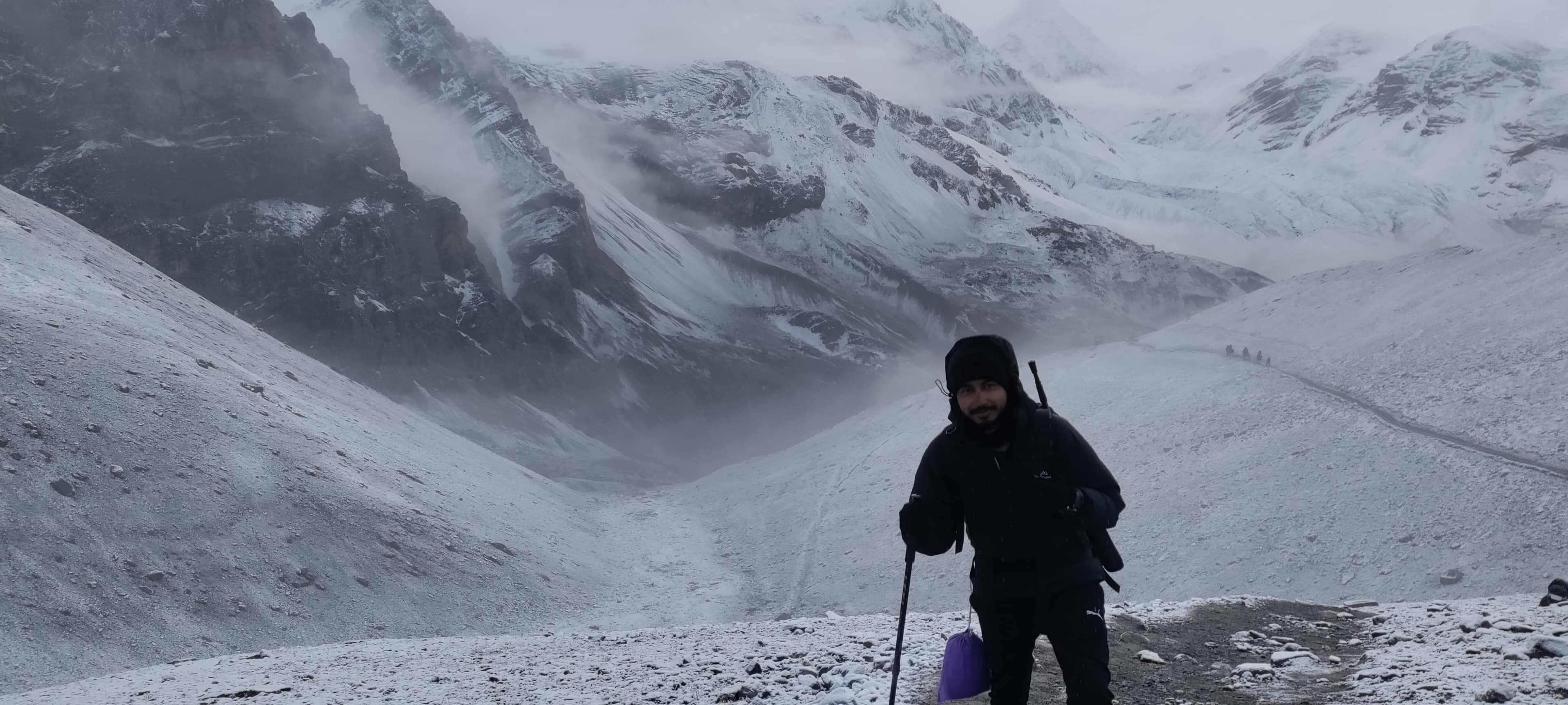 Standing in windy pass